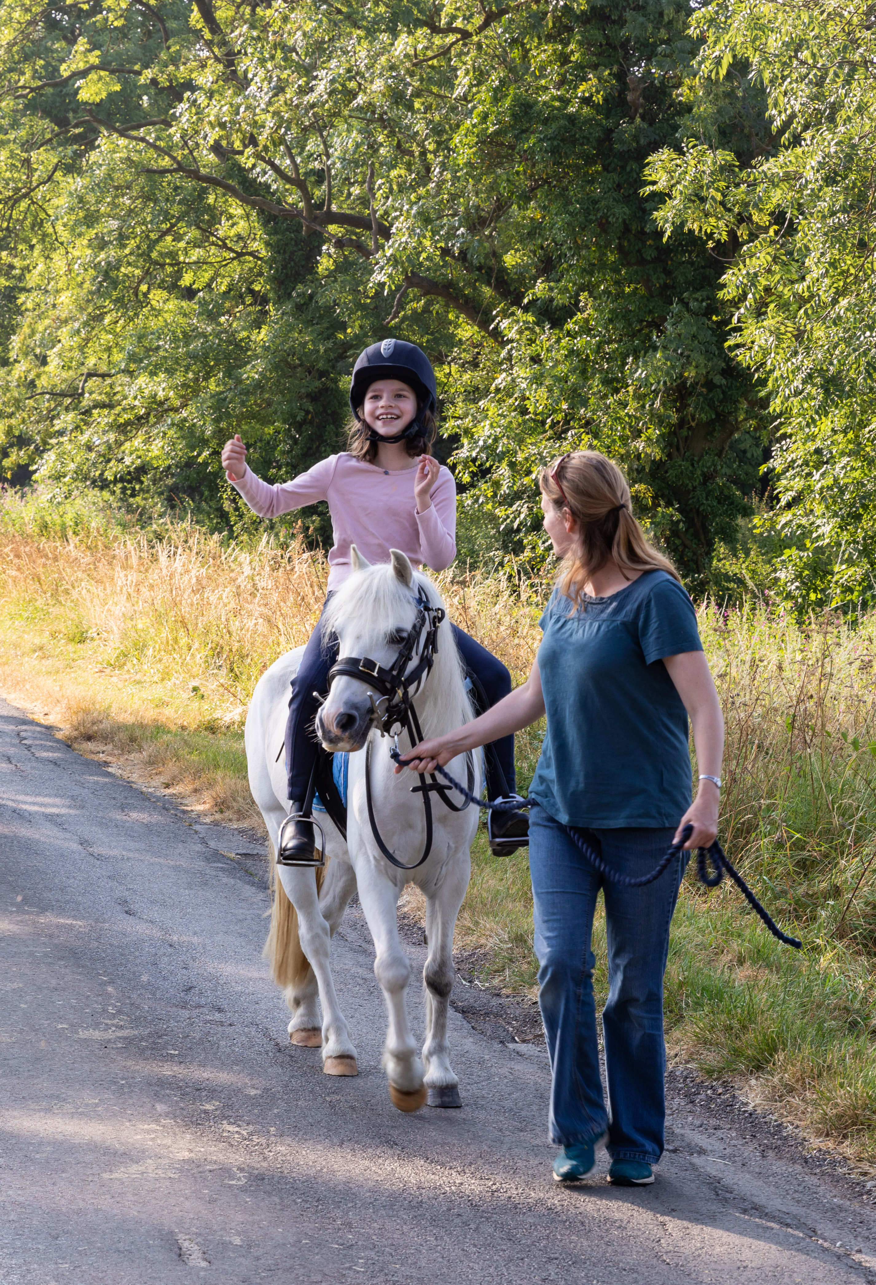 Happy Iris riding Blue